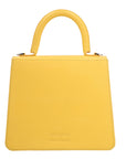 Bolso de piel Arthemisa by Benito Santos, color amarillo, piel grabada, bolso de mano, herraje en metal, accesorio y bolso de lujo, marca 100% mexicana, bolsa moderna, tamaño mediano, con asa de piel, cadena retirable, forro de tela, forma cuadrada, plumas avestruz.